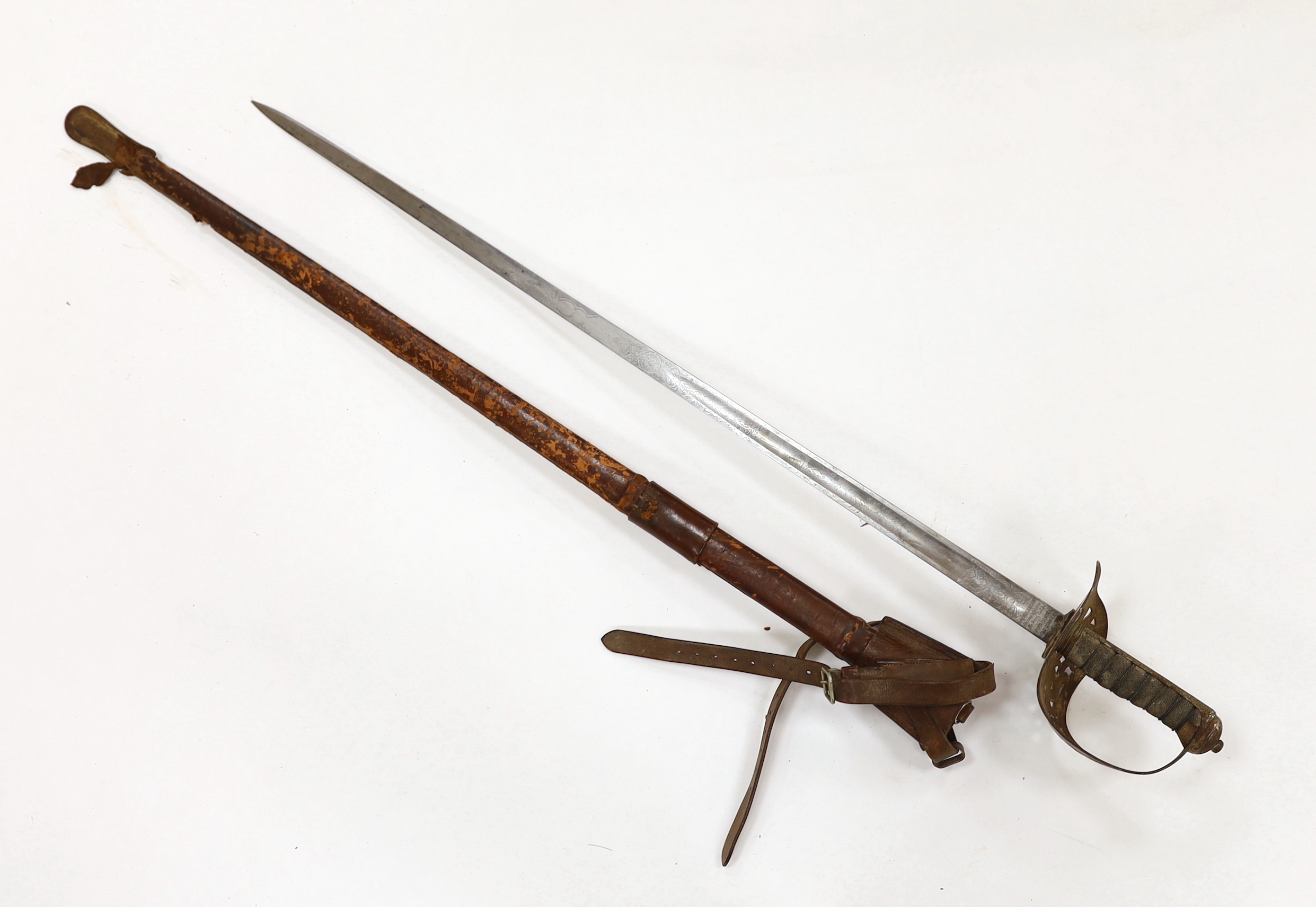 A Victorian 1897 pattern infantry officer's sword, maker Robert Mole & Sons, Birmingham, marked War and India offices, with scabbard and leather hanger, blade 82cm